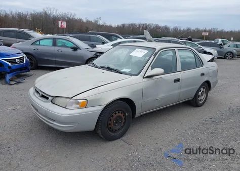 1999 Toyota Corolla Ve из США, поврежденный, VIN 2T1BR12E1XC128924
